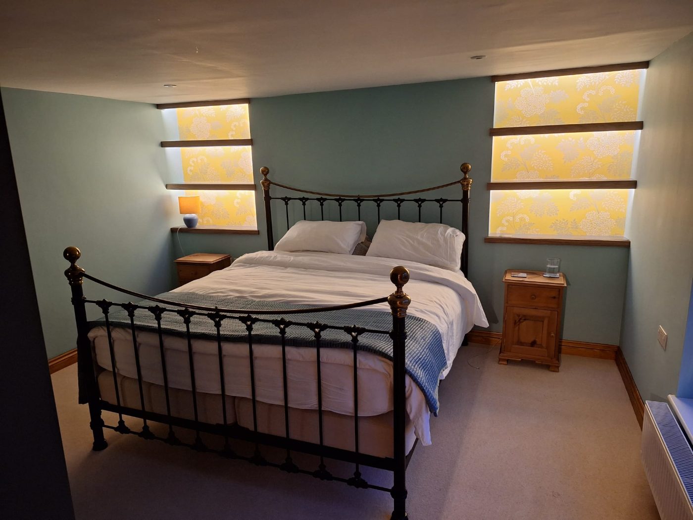 Feature lighting installed in a bedroom by G V Hall Ltd