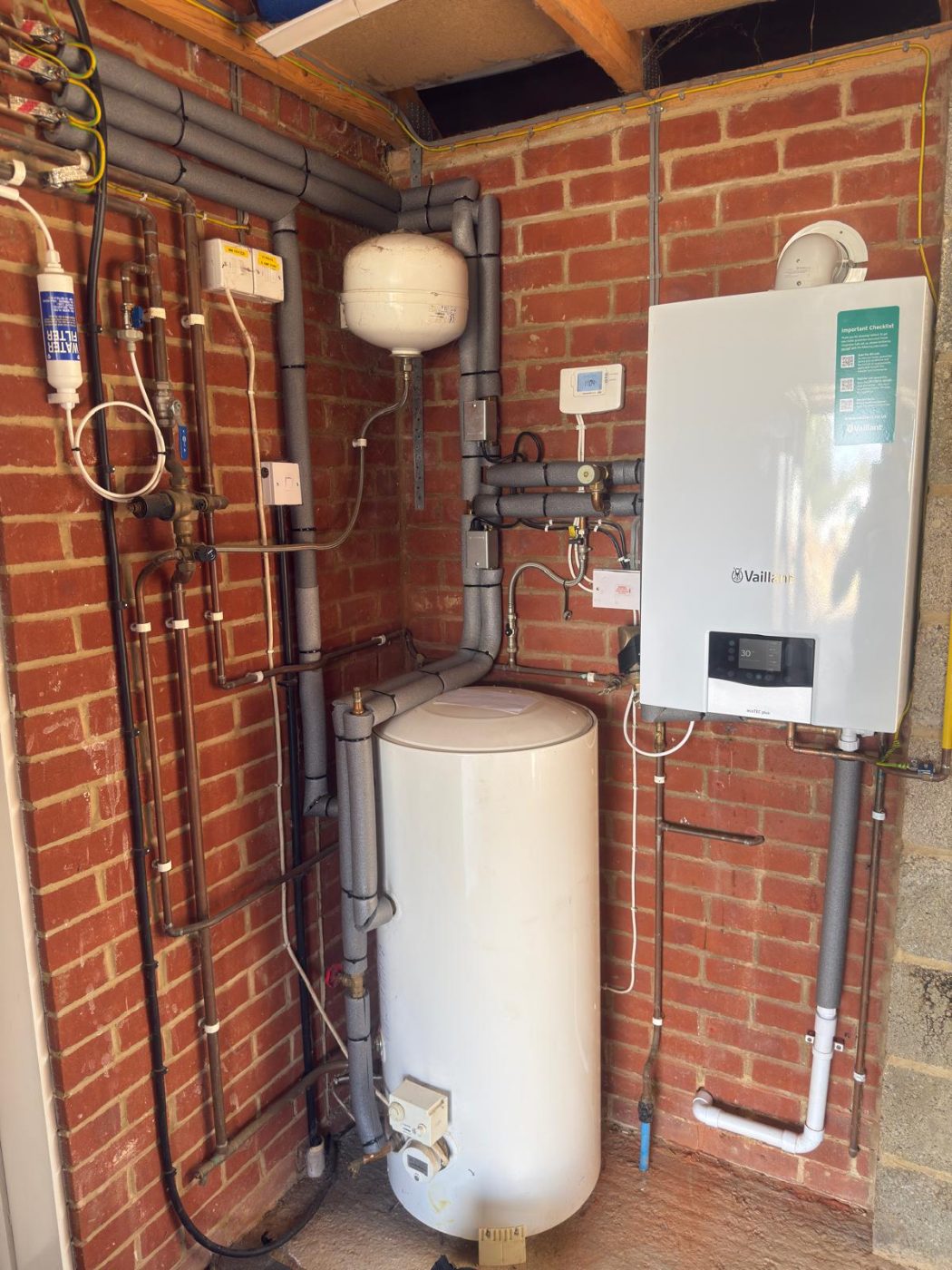 A boiler or hot water cylinder installed by G V Hall Ltd