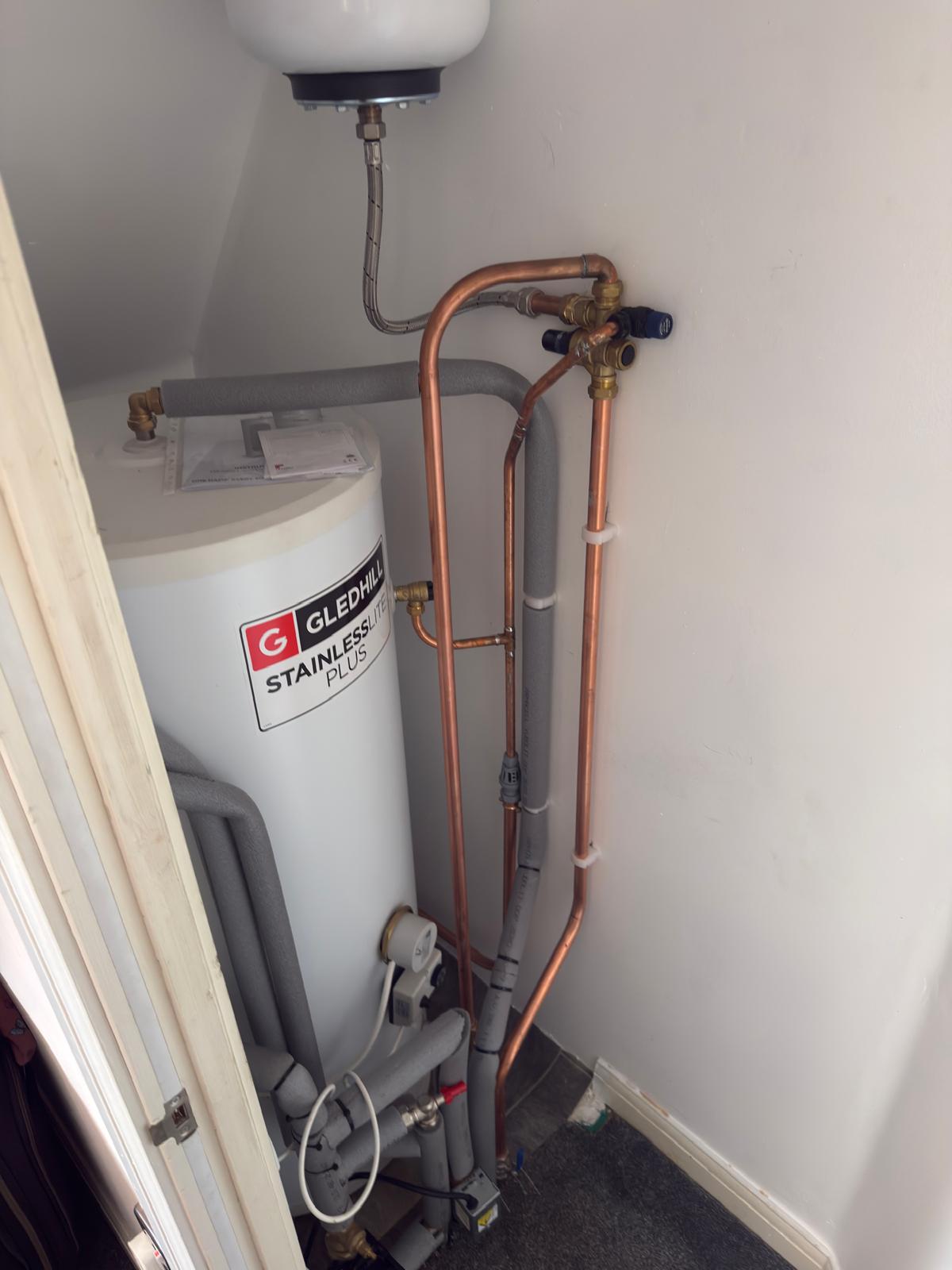 A boiler or hot water cylinder installed by G V Hall Ltd